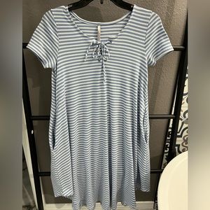 Light blue and white striped tie front dress with pockets